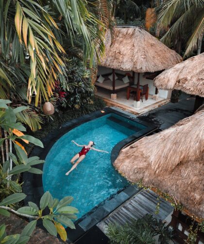 woman soaking on the swimming pool