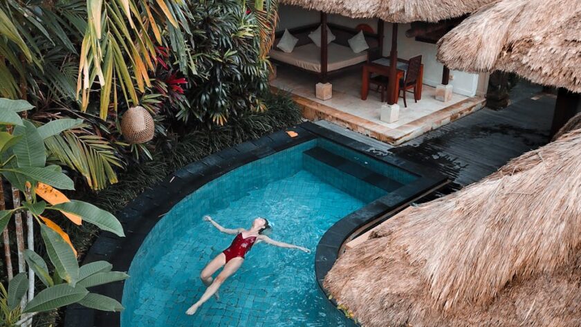 woman soaking on the swimming pool