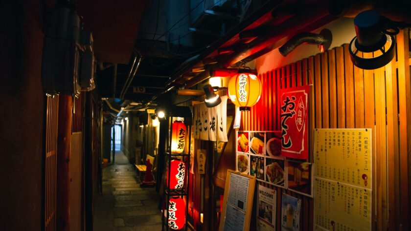 japanese cafes on empty narrow street in evening