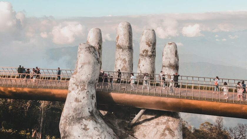 gray rock formation under white clouds during daytime